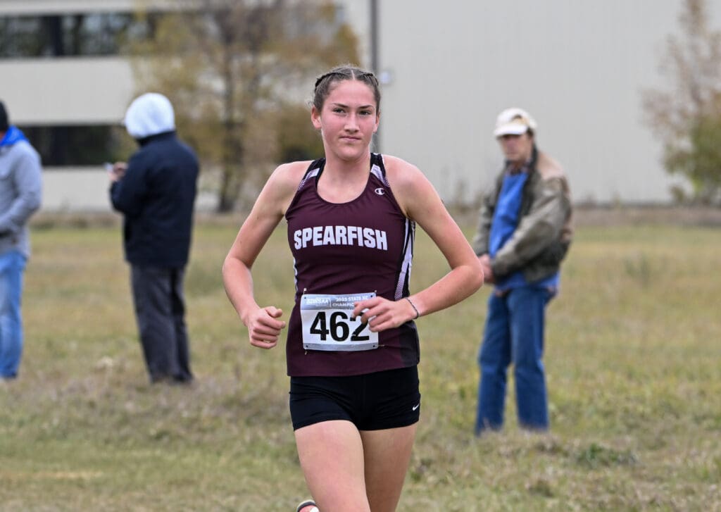 Peyton VanDeest of the Spearfish Spartans Girl Cross Country competes in the 2025 Class AA State Cross Country Meet.