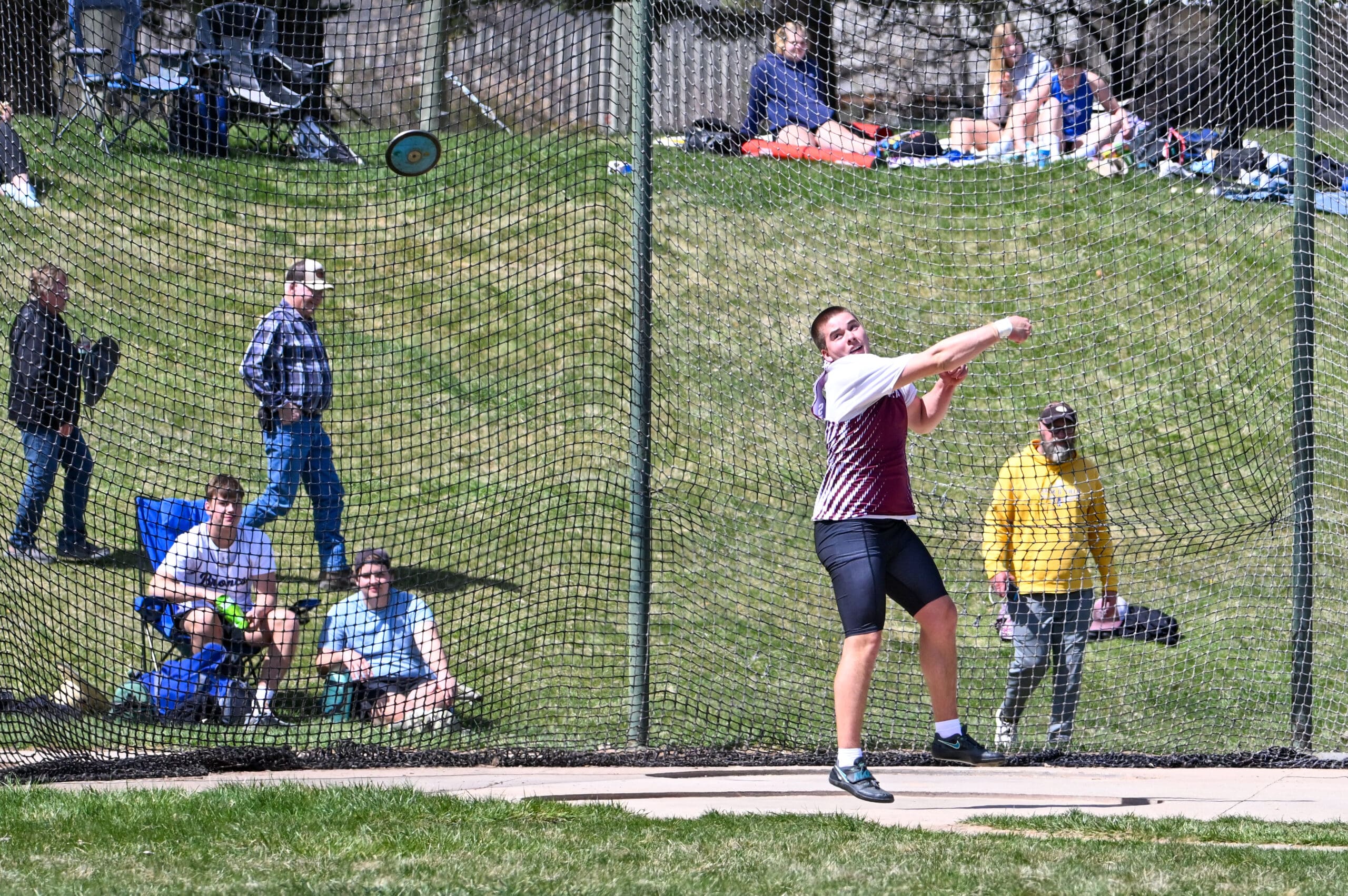 Samuel Marcus unleashes discuss at Queen City Classic Track Meet in Spearfish, SD.