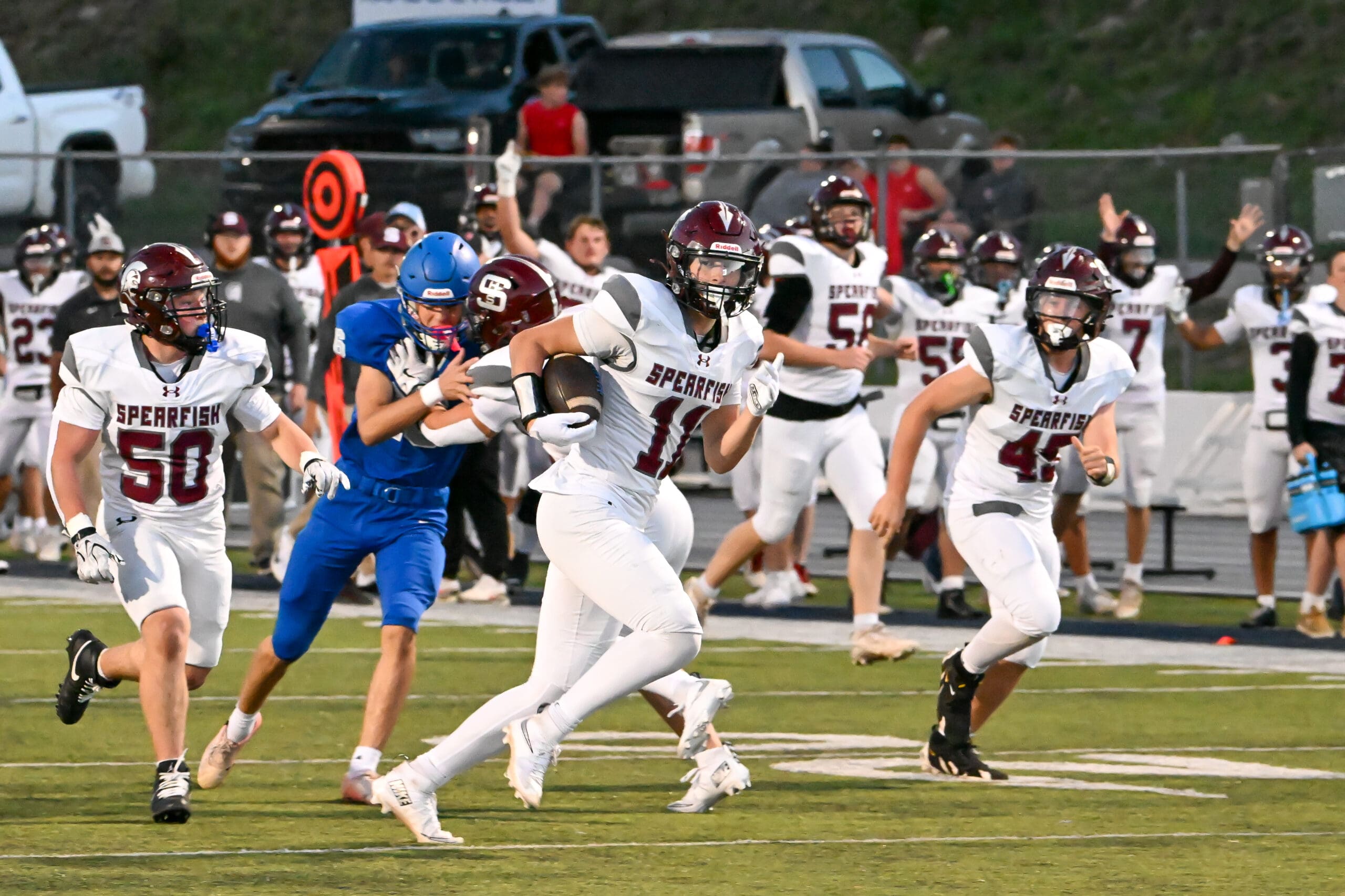 Kade Vavruska of the Spearfish Spartans Football team runs with ball after catching pass from Thomas Hughes in the Spartans 48-21 win over the Rapid City Stevens Raiders at the Rushmore Bowl in Rapid City on Friday, September 11, 2026.