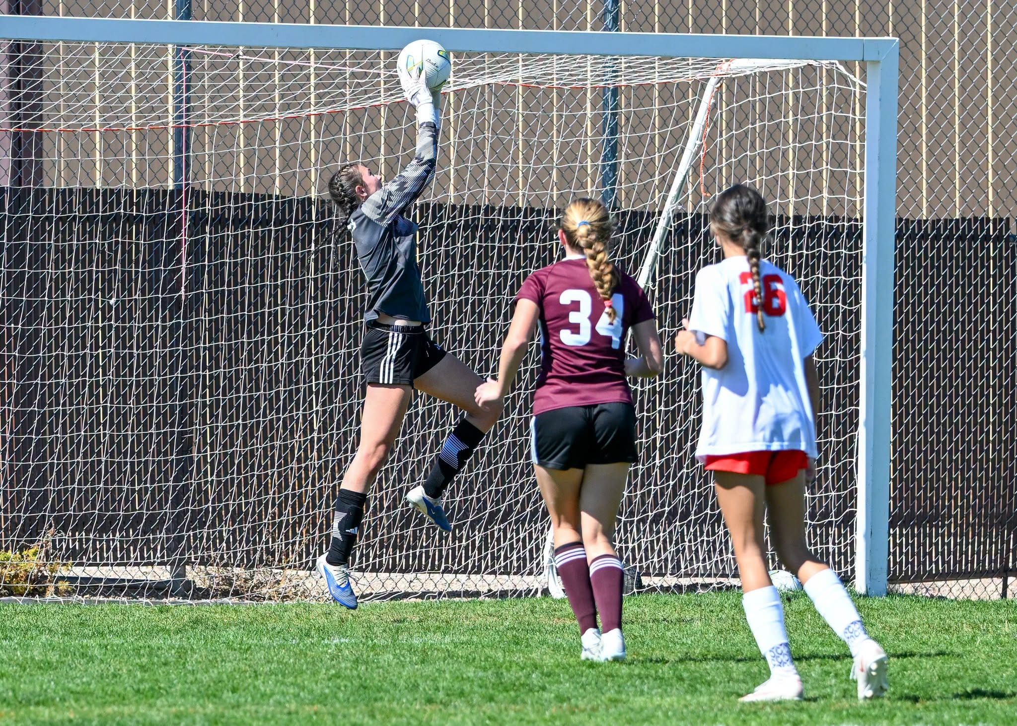 Madison Stohrer of the Spearfish Spartans Girls Soccer Team blocks a goal in the Spearfish Spartans 4-1 home win at the Black Hills Energy Power Sports Complex in Spearfish, SD against the Rapid City Central Cobblers.
