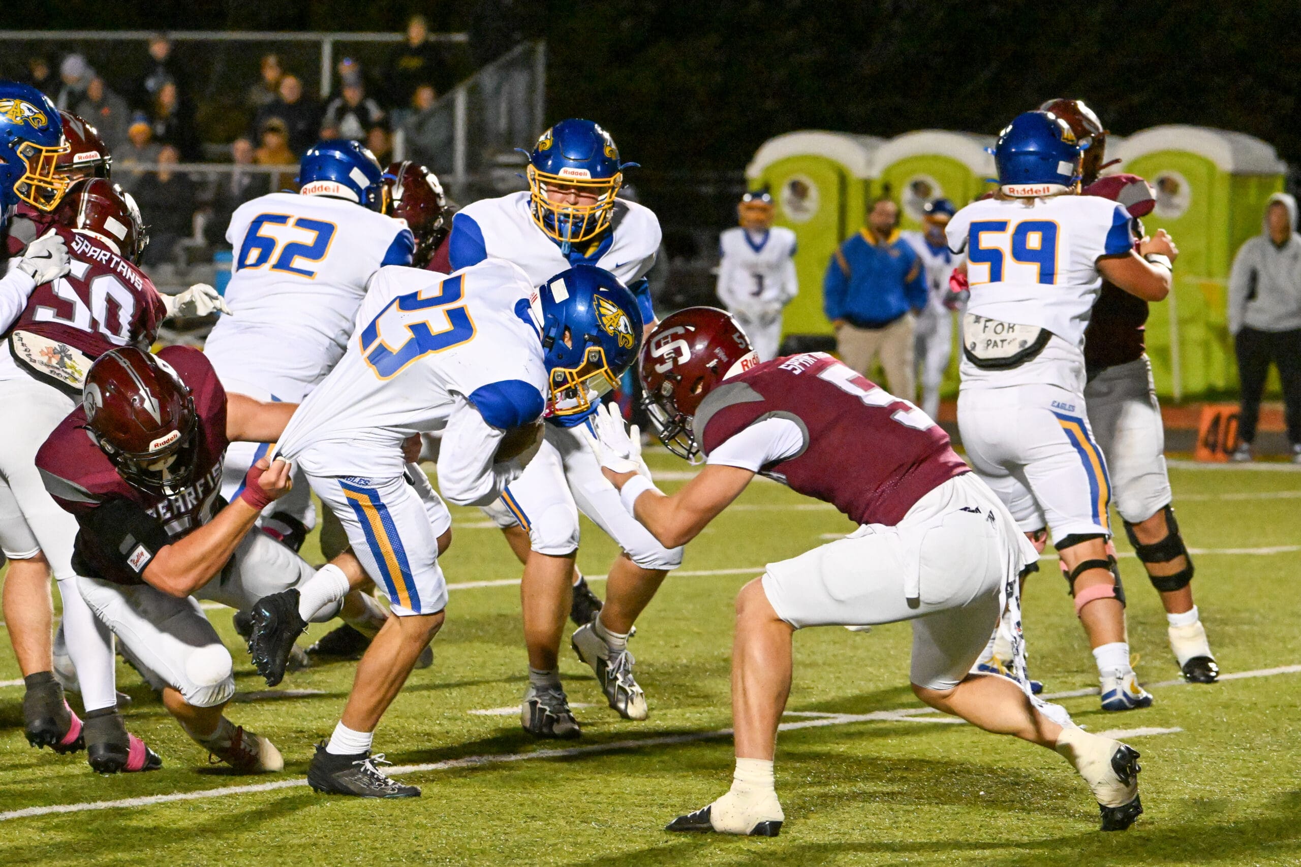 Karsen Seyer of the Spearfish Spartans Football team makes tackle on Aberdeen Central ballcarrier in Spearfish Spartans Senior night 28-20 victory on Friday, October 17.