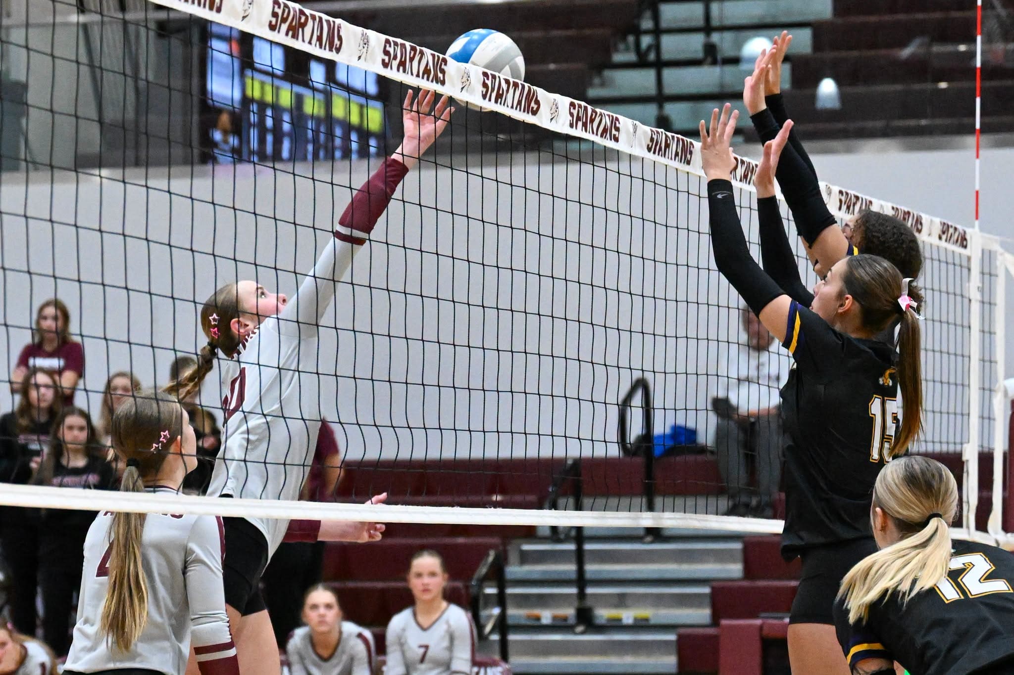 Finley Bouman of the Spearfish Spartans Volleyball Team goes up for a block against Campbell County at Spearfish High School on Tuesday, October 21.